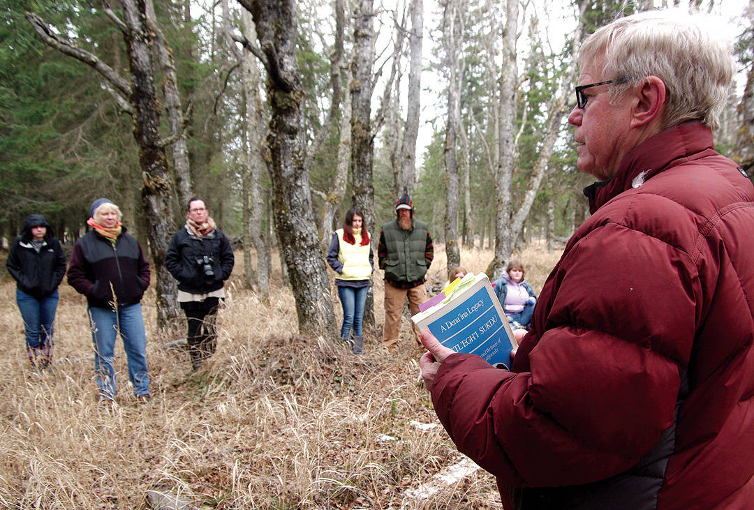 Dr. Alan Boraas, professor of anthropology at Kenai Peninsula College, leads a tour of Kalifornsky Villagein May 2015. The Native settlement was abandoned in the 1920s but is still home to a rich cultural history. (Photo courtesy of Jenny Neyman/Redoubt Reporter)