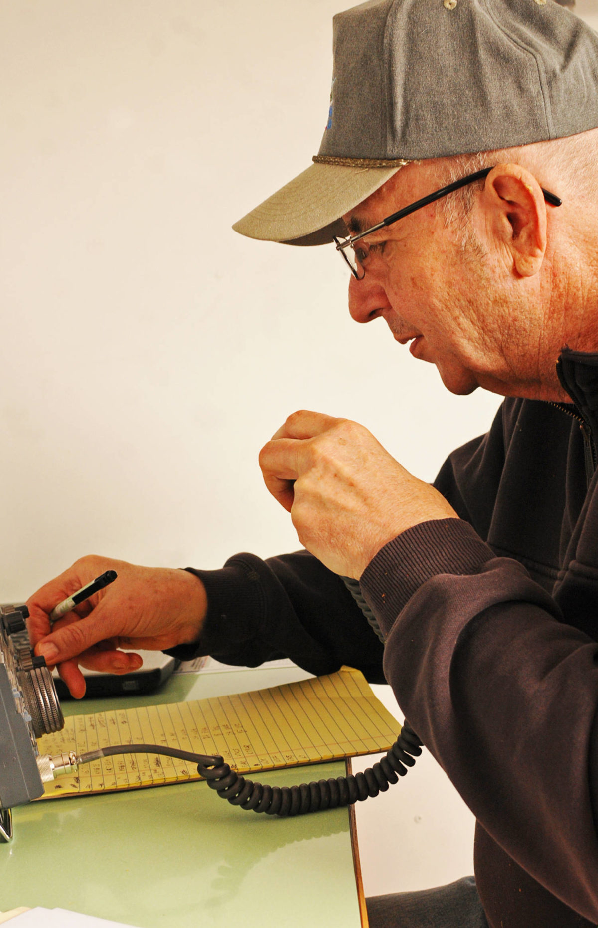 Ed Seaward operates a ham radio during the Moosehorn Amateur Radio Club’s annual field day event at Skyview Middle School on Saturday, June 23, 2018 near Soldotna, Alaska. The radio club joins with others across north America in a field day organized by the Amercan Radio Relay League every year, calling out to operators in Canada and the Lower 48 with the Kenai area’s call sign and recording how many contacts the operators make. Seaward, who moved to Soldotna from Connecticut about three years ago, said he has been operating ham radios since he was in high school and used them while he served in the military. (Photo by Elizabeth Earl/Peninsula Clarion)