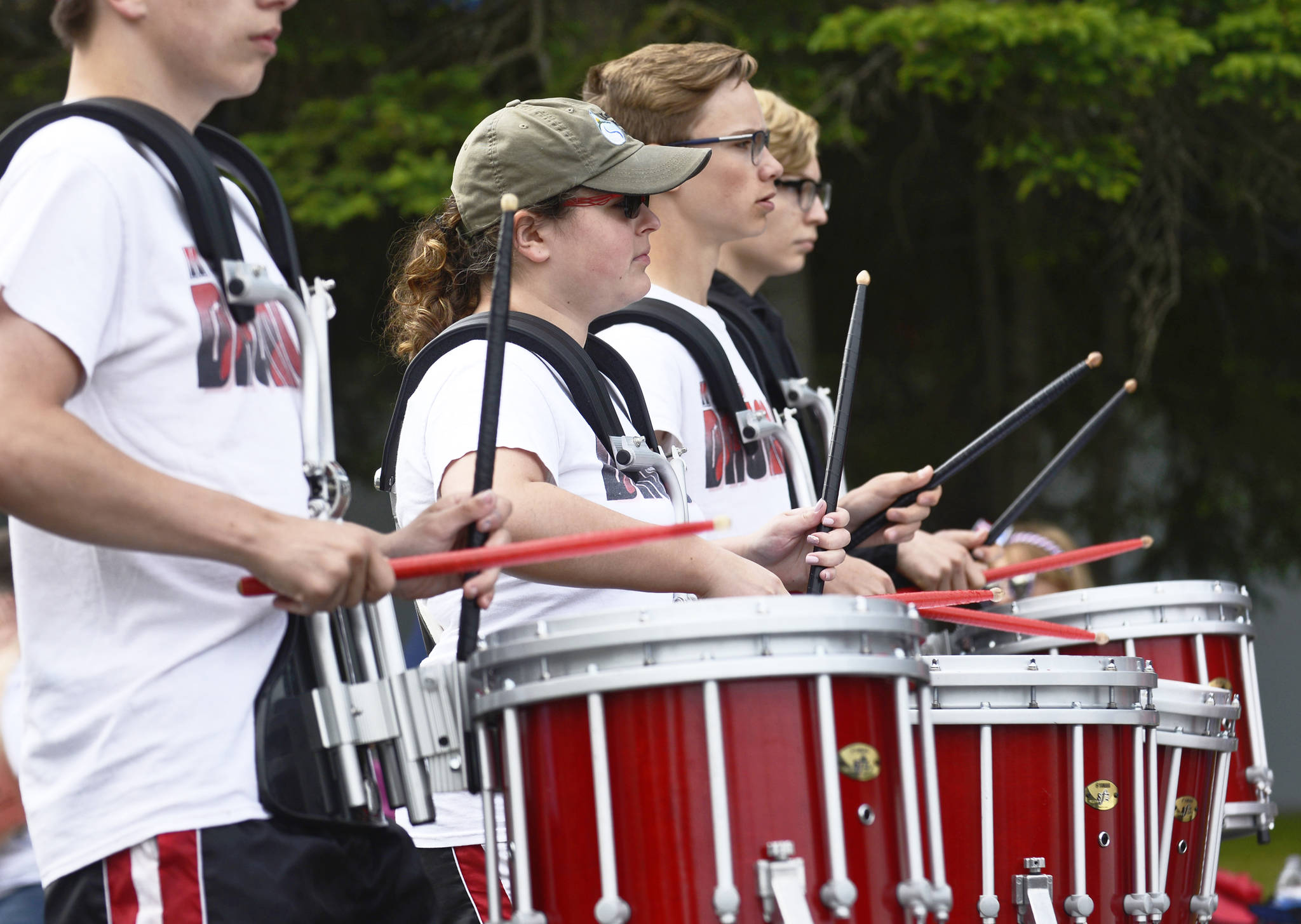 Kenai’s American Legion Post 20 drives their truck remodeled as a steam locomotive during Kenai’s Fourth of July parade on Wednesday, July 4, 2018 in Kenai, Alaska. Aboard are members of the Legion-sponsored Twins baseball team. (Ben Boettger/Peninsula Clarion)                                  Snare drummers from Kenai Central High School’s drumline perform in the Kenai’s Fourth of July parade on Wednesday, July 4, 2018 in Kenai, Alaska. (Ben Boettger/Peninsula Clarion)                                 Wildland firefighters from the Alaska Division of Forestry march in Kenai’s Fourth of July parade on Wednesday, July 4 in Kenai, Alaska. (Ben Boettger/Peninsula Clarion)