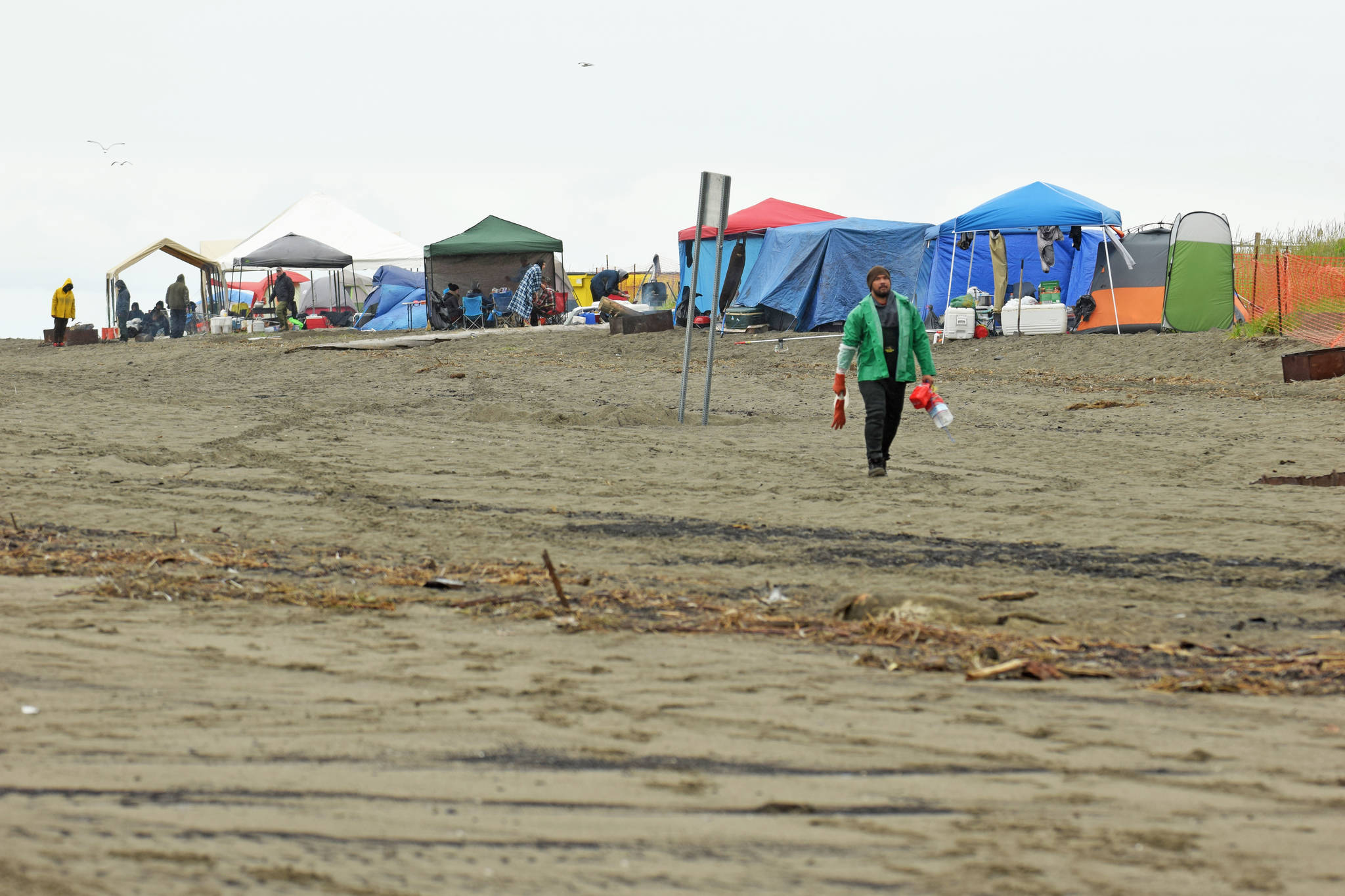 Tents stand on Kenai Beach on Tuesday, July 10, 2018, during the first day of the dipnetting season. Alaskans from around the state travel to Kenai to participate in the three-week season, which allows residents to harvest salmon and flounder for personal use. (Photo by Erin Thompson/Peninsula Clarion)