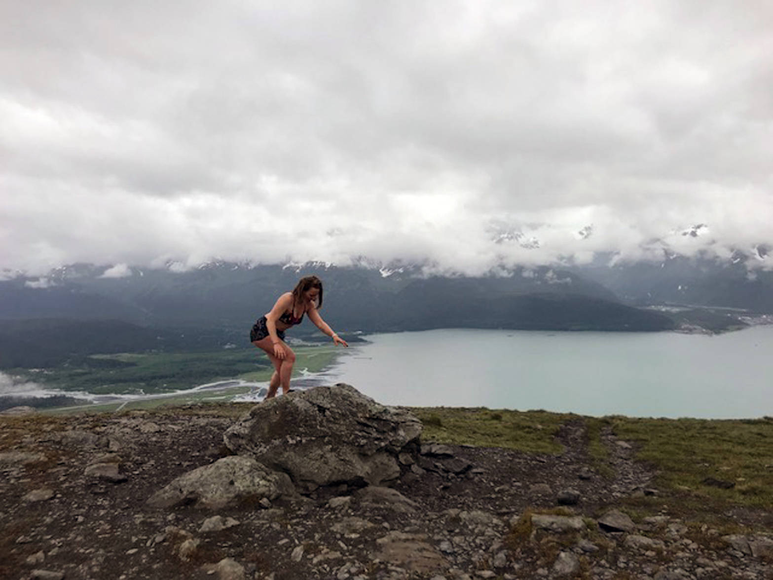 The author stumbles at the rock marking the race point on the Mount Marathon Race trail during one of her many training runs in preparation for the July 4, 2018, race. (Photo provided by Kat Sorensen)