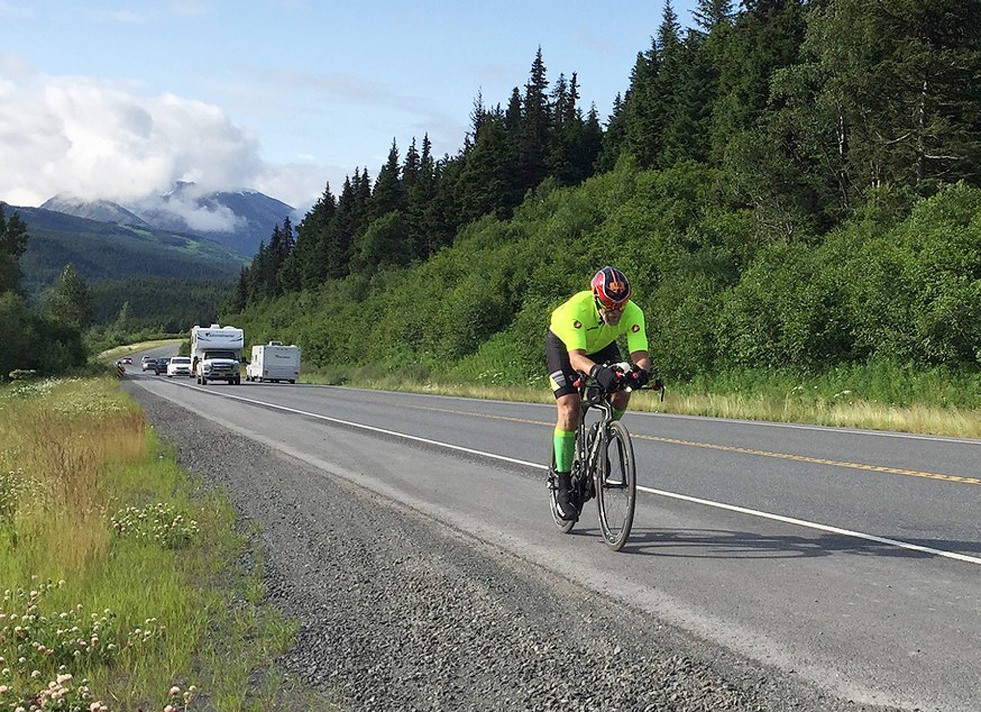 Kenai racer Jeff McDonald cycles up the Seward Highway in the inaugural Alaskaman Extreme Triathlon race in July 2017. (Photo provided by Jeff McDonald)