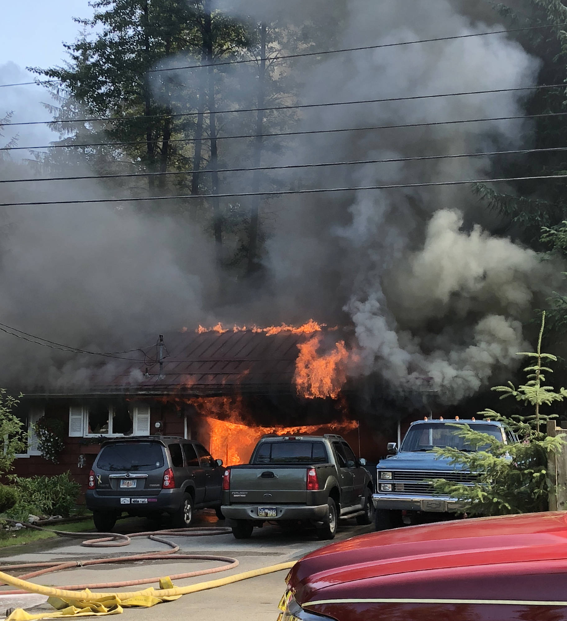 A house at 8460 Kimberly Street burns as Capital City Fire/Rescue responses on Friday, July 20, 2018. (Anna Hay | Courtesy Photo)