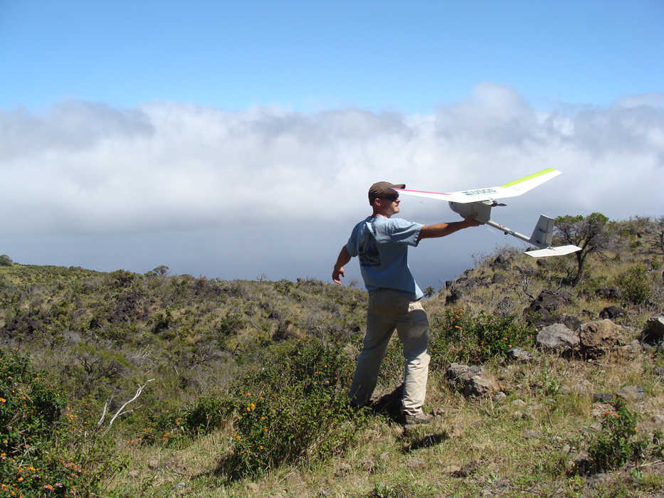 USGS photo Launching a Raven Unmanned Aircraft System (aka drone) at Haleakala National Park in Hawaii to survey invasive plants and animals.