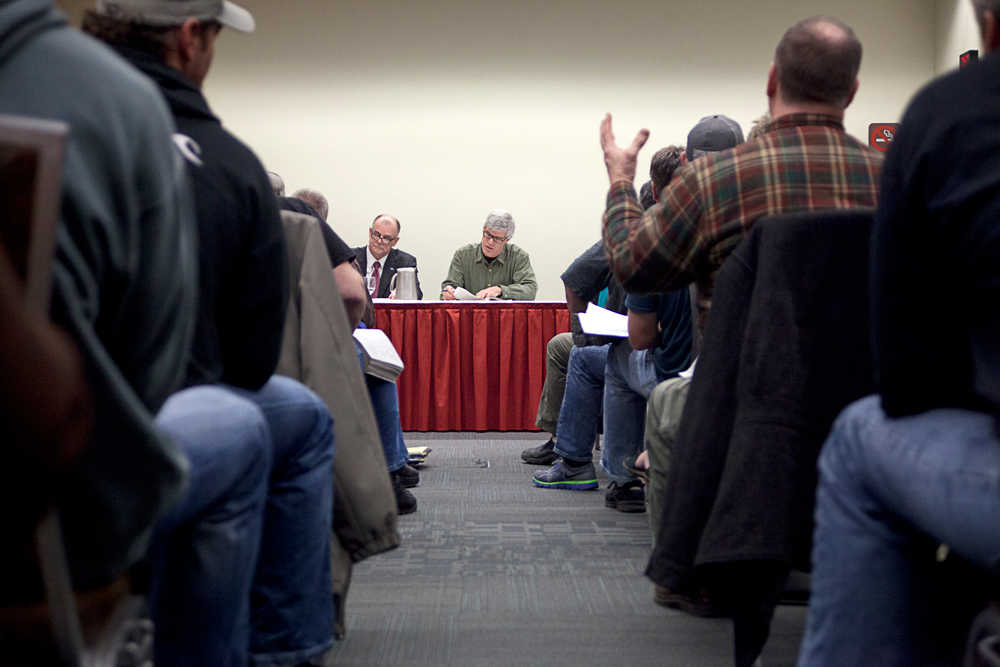 Photo by Rashah McChesney/Peninsula Clarion  Alaska Board of Fisheries members John Jensen and Tom Kluberton hear committee testimony during the triennial Upper Cook Inlet meeting Thursday Feb. 6, 2014 in Anchorage, Alaska.