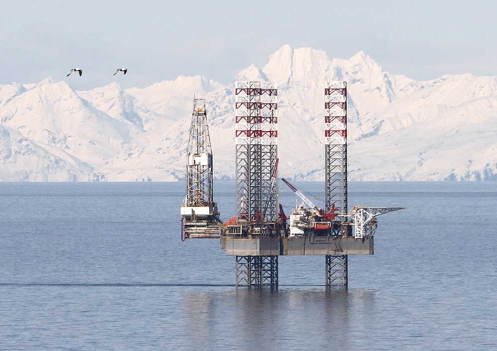 Peninsula Clarion file photo The Endeavour-Spirit of Independence jack up rig is seen here in early April 2013 at the Cosmopolitan site near Anchor Point. With numerous companies exploring and producing in the region, it is shaping up to be a busy year in the Cook Inlet basin.