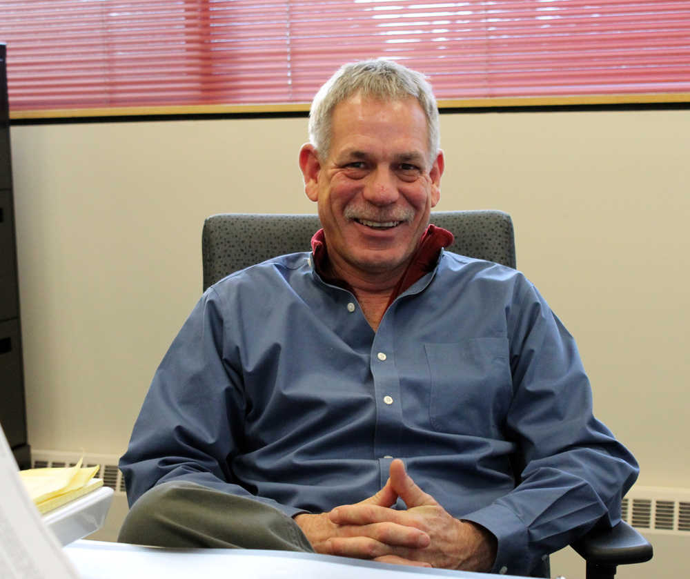 Photo by Dan Balmer/Peninsula Clarion New Kenai City Planner Francis Krizmanich sits at his desk at city hall last Thursday. Krizmanich moved to Kenai from Aspen, Colorado, where he spent the last 17 years as a planning consultant to the city.