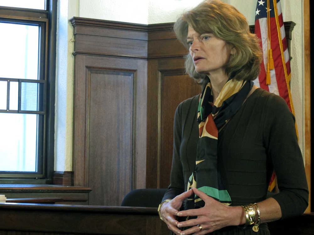 U.S. Sen. Lisa Murkowski addresses reporters during a news conference following her speech to a joint session of the Alaska Legislature on Wednesday, Feb. 19, 2014, in Juneau, Alaska. (AP Photo/Becky Bohrer)