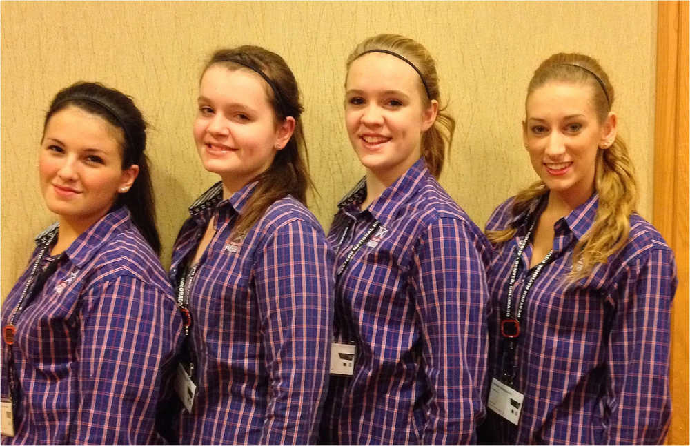 Photo courtesy from Geri Litzen Four members of the Kenai Peninsula horse quiz team known as the North Wind Riders took fourth place in horse bowl at the Western National Roundup Jan. 8-12 in Denver, Colo. From left, Makayla Derkevorkian, Penelope Litzen, Chena Litzen and Emma Osimowicz.