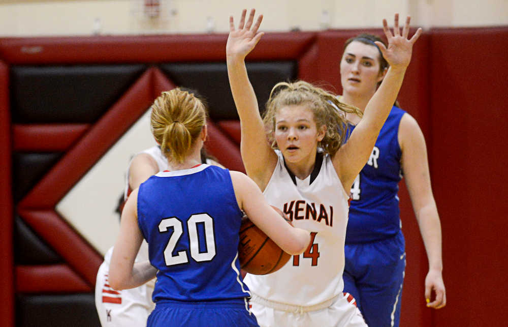 Photo by Rashah McChesney/Peninsula Clarion  Kenai's Alli Steinbeck defends the basket during their game against Palmer Thursday Feb. 20, 2014 in Kenai, Alaska.