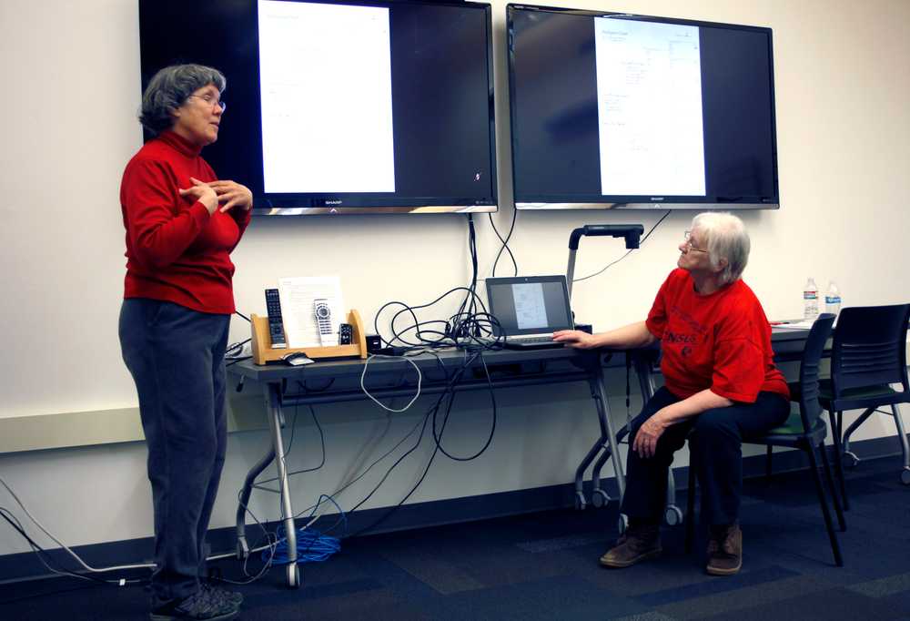 Kari Mohn (left) and Loretta Mattson, Kenai Totem Tracers Genealogical Society members, practice on Wednesday for their "Your Family Tree - Getting Started" presentation to be held at 1 p.m. on March 8 at the Kenai Community Library. Photo by Kaylee Osowski/Peninsula Clarion