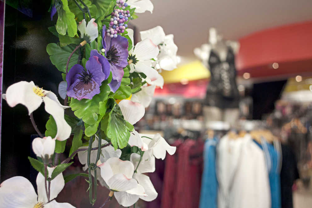 Photo by Rashah McChesney/Peninsula Clarion Flowers adorn the entrance to Lea's boutique Friday Feb. 28, 2014, a new adult shop located on the Kenai Spur Highway just north of Soldotna. Co-owners Steve and Lea Stuber say they want to provide a safe and comfortable atmosphere for people who shop for intimate products.