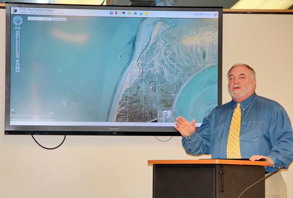 Photo by Dan Balmer/Peninsula Clarion Kenai City Manager Rick Koch discusses proposed changes to south beach access during dipnet season at a Kenai City Council work session Tuesday night.