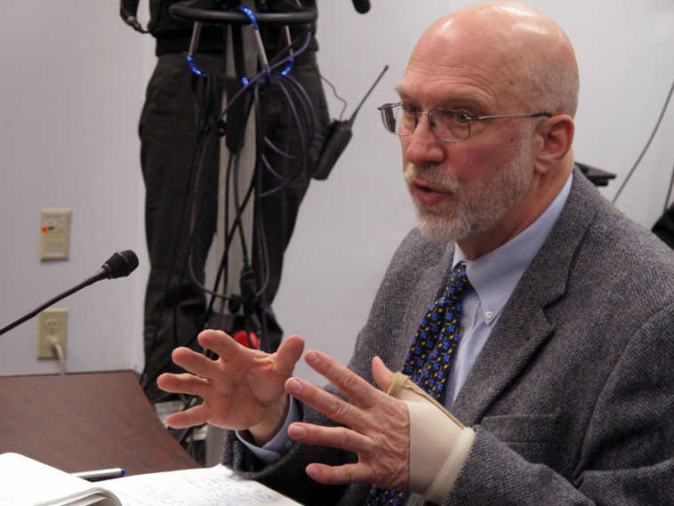 Former Alaska Supreme Court Chief Justice Walter Carpeneti testifies against a proposed constitutional amendment to change the makeup of the Alaska Judicial Council during a House Judiciary Committee hearing on Wednesday, March 5, 2014, in Juneau, Alaska. (AP Photo/Becky Bohrer)