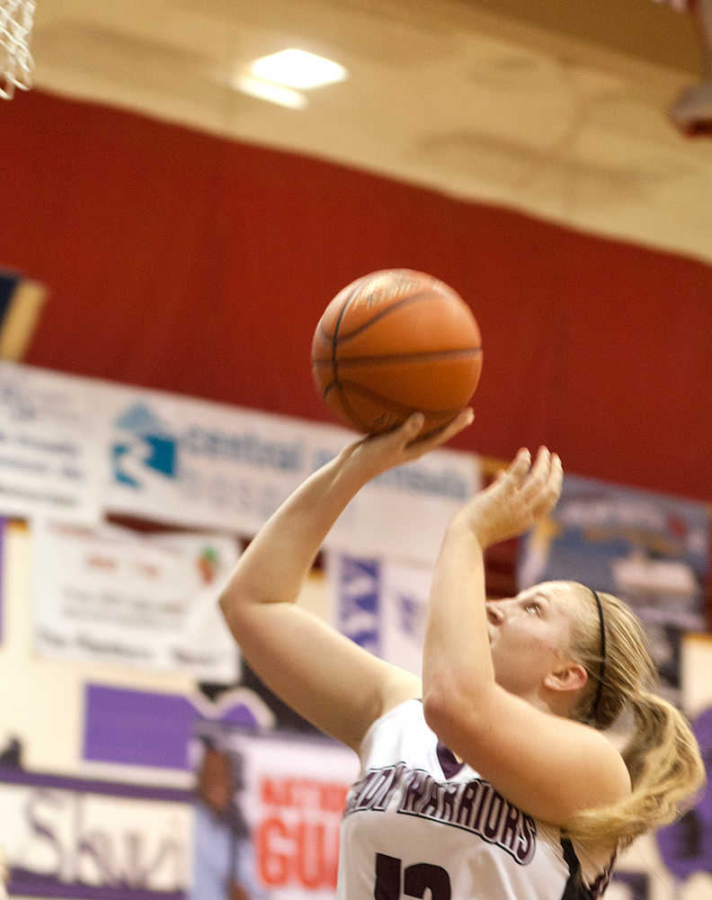 Photo by Rashah McChesney/Peninsula Clarion  Nikolaevsk's Sophia Kalugin shoots during their game against Ninilchik for the Peninsula Conference Tournament Thursday March 6, 2014 at Skyview High School in Soldotna, Alaska.