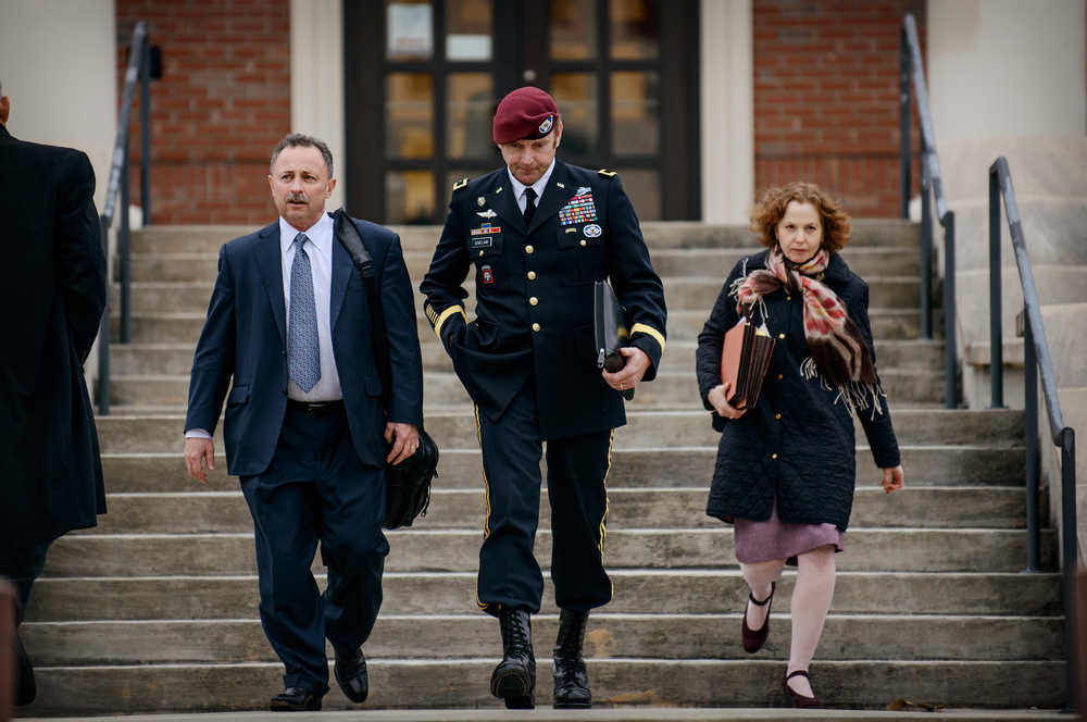 FILE - In this March 4, 2014 file photo, Brig. Gen. Jeffrey Sinclair leaves the courthouse with his lawyers Richard Scheff, left, and Ellen C. Brotman, following a day of motions at Fort Bragg, N.C. Less than a month before Sinclair's trial on sexual assault charges, the lead prosecutor broke down in tears Tuesday as he told a superior he believed the primary accuser in the case had lied under oath. (AP Photo/The Fayetteville Observer, James Robinson)  MANDATORY CREDIT