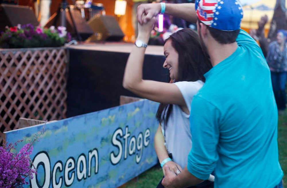 Clarion file photo A couple dances during Salmonstock during a 2013 performance in Ninilchik, Alaska.