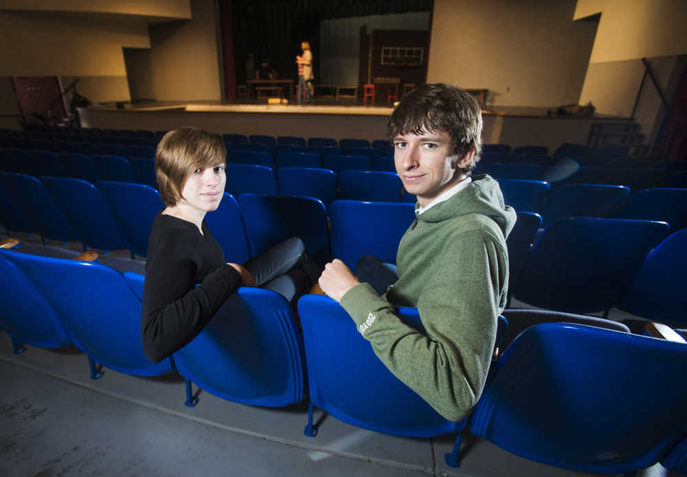 St. Gregory College Preparatory School seniors Victoria Stiely, left, 18, and Peter Chipman, 17, pose for a portrait in their school's auditorium on Wednesday, March  12, 2014, in Tucson, Ariz. The pair's 10-minute comedic play, entitled "Set Back", won a nationwide playwright competition sponsored by David Letterman's World Wide Pants production company.  (AP Photo/Arizona Daily Star, Mike Christy)  ALL LOCAL TV OUT; PAC-12 OUT; MANDATORY CREDIT