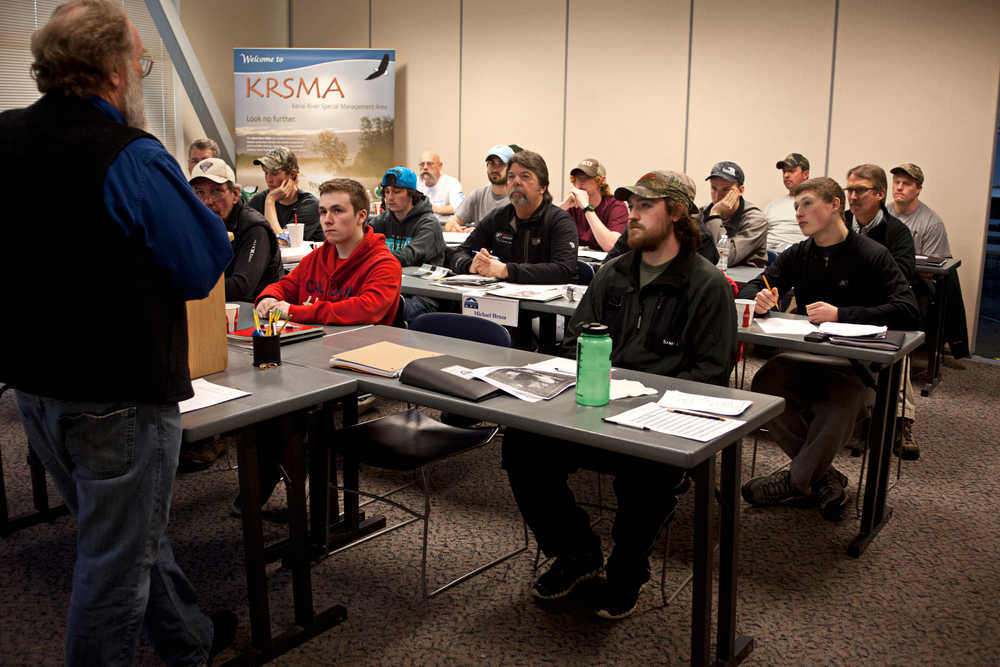 Photo by Rashah McChesney/Peninsula Clarion  Kenai Peninsula College Kenai River Campus biology professor David Wartinbee teaches during a session of the Kenai River Guide Academy, Thursday March 13, 2014 in Soldotna, Alaska. The academy is required of all Kenai River guides.