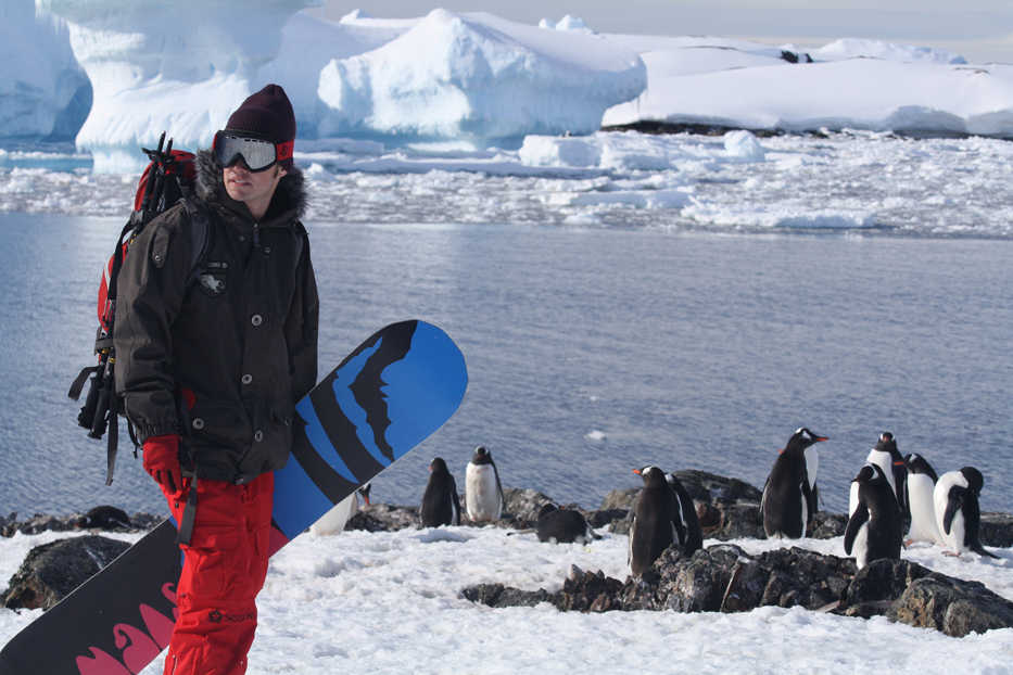 In this November 2008  photo provided b TwoSticksAndABoard.com, Sean Busby stands at scenic site in Antarctica. By riding the highest mountain range in North Africa this year, Busby became the first person with Type 1 diabetes to snowboard on all seven continents. (AP Photo/TwoSticksAndABoard.com)