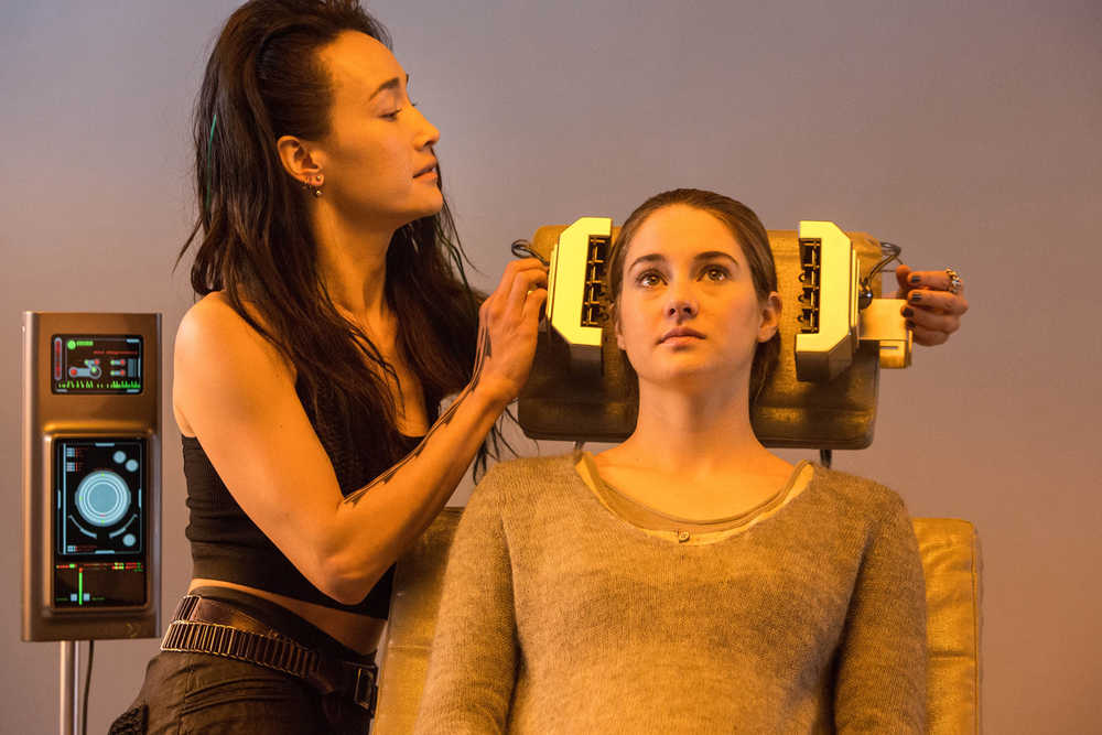 This photo released by Summit Entertainment, LLC shows Maggie Q, left, as Tori and Shailene Woodley as Beatrice "Tris" Prior, in the film, "Divergent." The film releases Friday, March 21, 2014. (AP Photo/Summit Entertainment, Jaap Buitendijk)