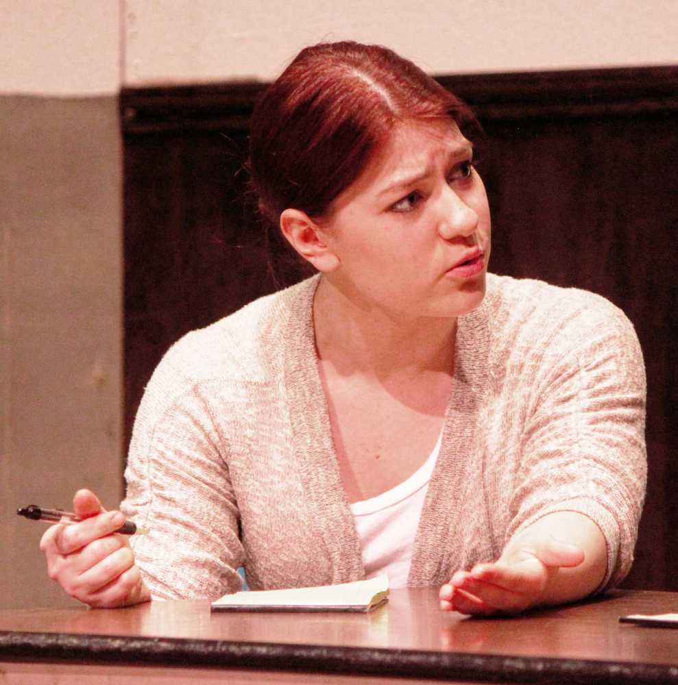 Photo by Kelly Sullivan/ Peninsula Clarion Gabriella Saldivar acts as the dissenting voice in "Twelve Angry Jurors" at a dress rehearsal, Tuesday, March 25, in the Soldotna High School Auditorium.