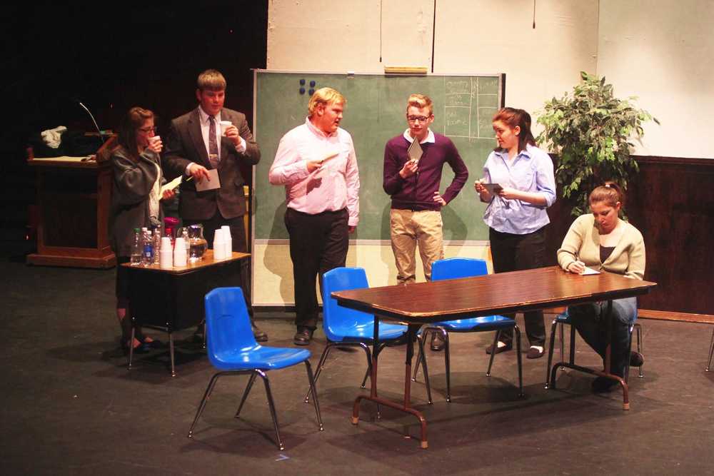 Photo by Kelly Sullivan/ Peninsula Clarion Students rehearse during a run-through for "Twelve Angry Jurors", Soldotna High School's modernization of Reginald Roses's play "Twelve Angry Men", on Tuesday, March 25, in the SoHi auditorium.