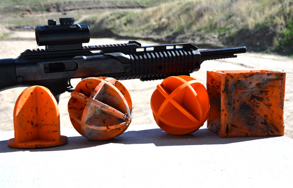 In this photo taken March 7, 2014, a number of self healing targets are displayed including some that have taken hundreds of rounds from pistols and rifles in Emmett, Idaho. If you're a shooter, you know putting holes in paper can get boring. No matter how tight a group you can shoot, it can be just as satisfying to make an aluminum can dance with a .22 rifle. With the exploding popularity of AR-15 rifles, lots of folks have taken their plinking to a new level at longer distances and with different targets. (AP Photo/Idaho Statesman, Roger Phillips)