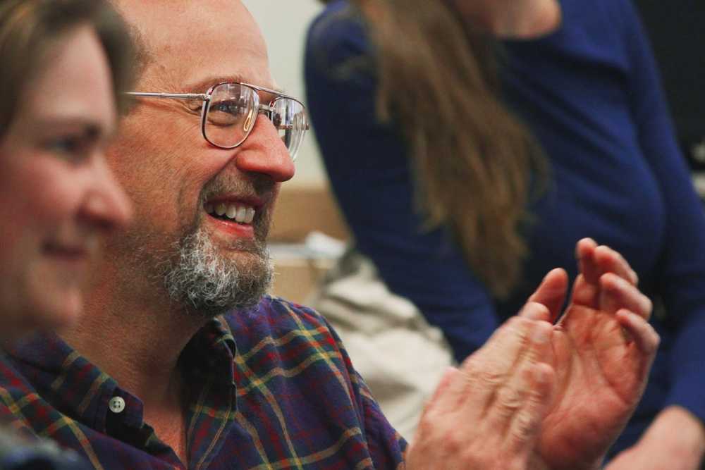 Photo by Kelly Sullivan/ Peninsula Clarion Dr. Paul Landen claps for the final speaker at the Alaska Native Oratory Society, Friday, March 28, at Kenai Peninsula College