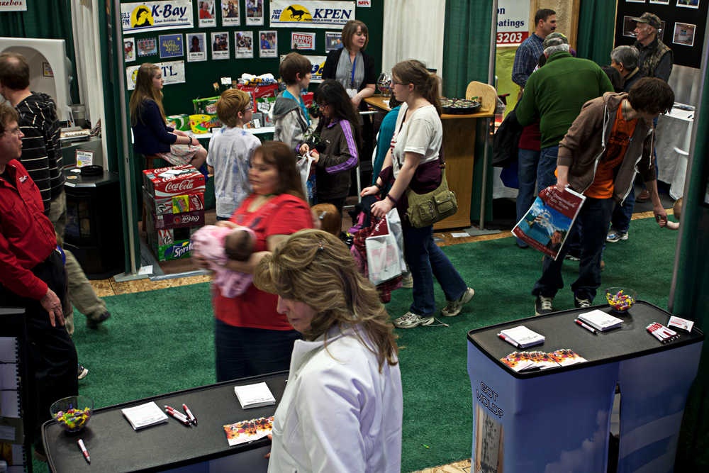 Photo by Rashah McChesney/Peninsula Clarion  Hundreds of people gathered for the 35th annual Home Show Sunday April 13, 2014 in Soldotna, Alaska.  More than 111 vendors were on hand to showcase their wares.