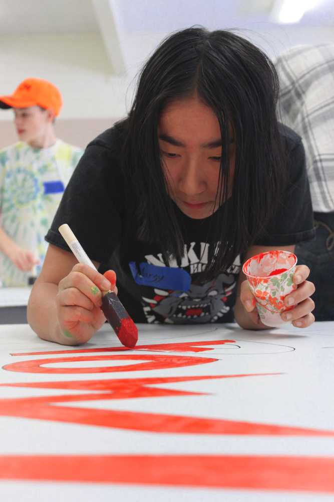 Photo by Kelly Sullivan/ Peninsula Clarion Alaska State Council on the Arts and the Nikiski Recreation Center paid for the Nikiski community mural's materials that were used on Friday and Saturday, April 11 and 12, at the Nikiski Recreation Center. Nikiski community mural were funded by