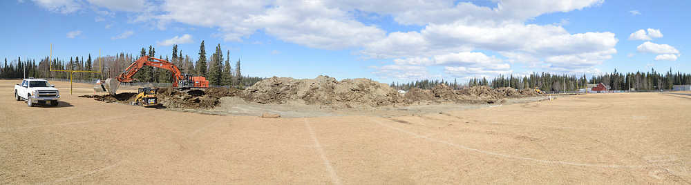 Photo composite by Rashah McChesney/Peninsula Clarion  This composite of several images shows the excavation of a Soldotna High School field Tuesday April 22, 2014 in Soldotna, Alaska.