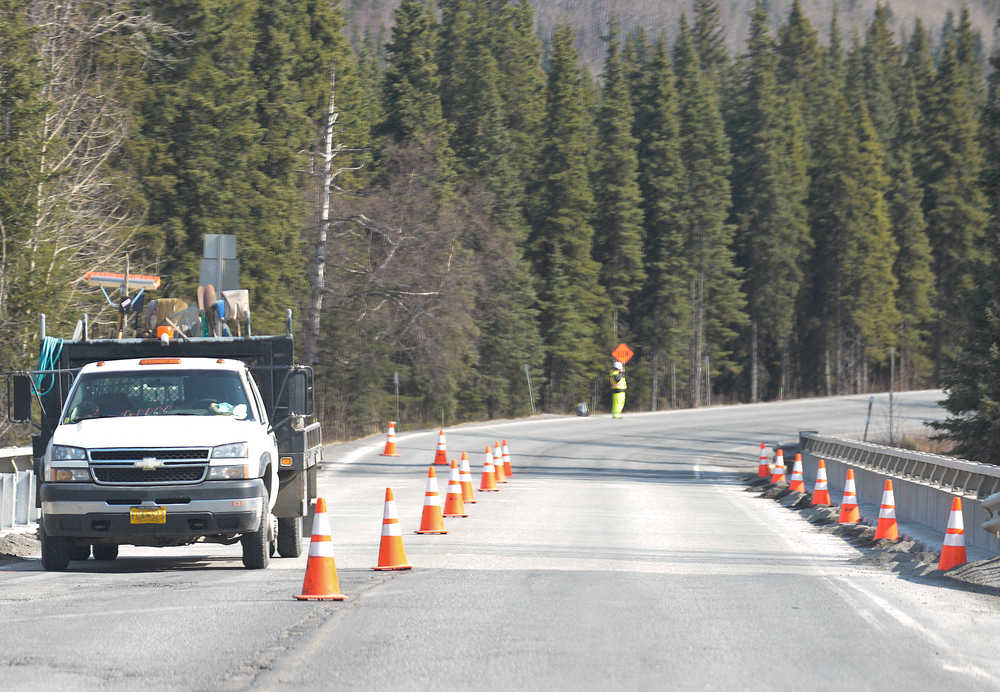 Photo by Rashah McChesney/Peninsula Clarion   The Sterling Highway narrows down to one lane on a bridge near Cooper Landing Saturday 19, 2014 in Cooper Landing, Alaska.