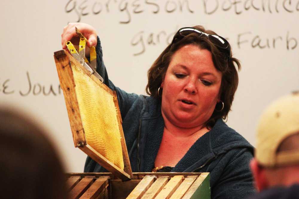 Photo by Kelly Sullivan/ Peninsula Clarion Jim Van Raden said sometimes nectar solidifies and remains in the comb inside a beehive, Tuesday, April 22 at his home near Kasilof.