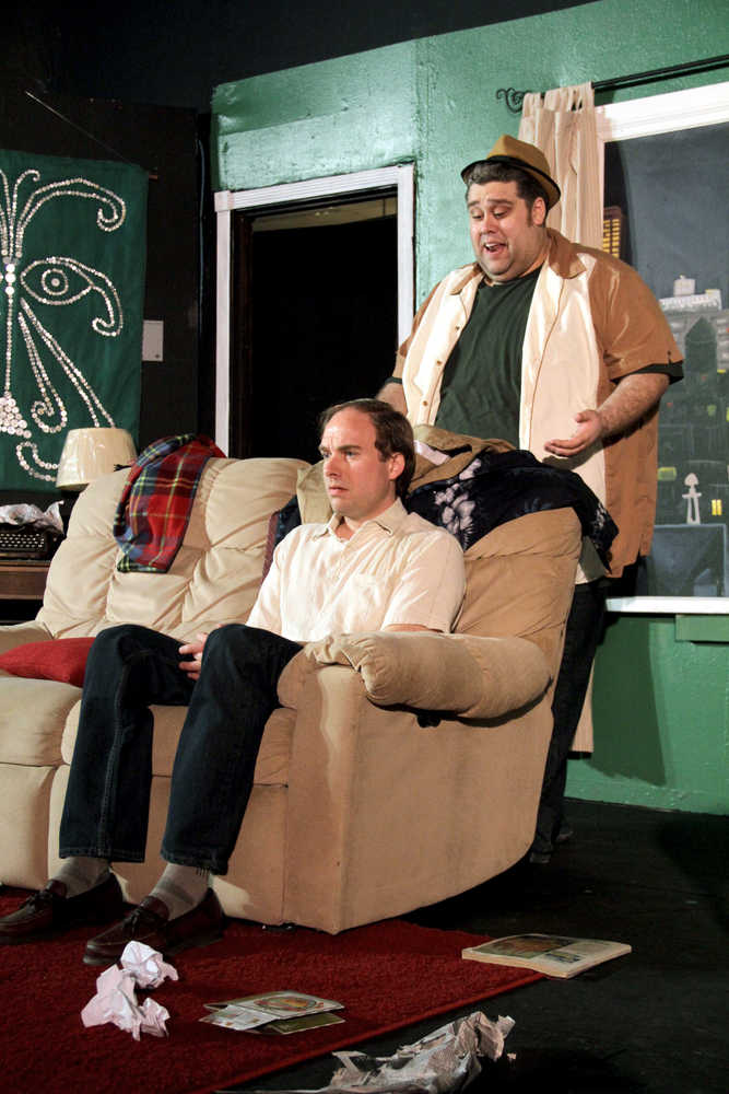 Jamie Nelson, sitting, plays Felix Ungar and Ian McEwen, standing, plays Oscar Madison in Neil Simon's "The Odd Couple" at a dress rehearsal on Tuesday. Performances, directed by Angie Nelson, will the Thursday, Friday and Saturday at the Triumvirate Theatre in Soldotna. Photo by Kaylee Osowski/Peninsula Clarion