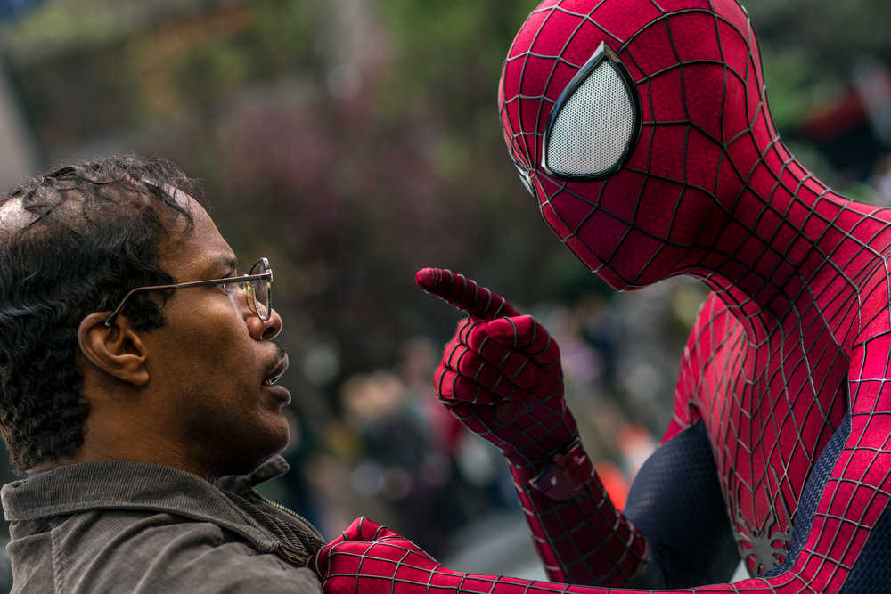 This image released by Sony Pictures shows Jamie Foxx, left, and Andrew Garfield as Spider-Man in "The Amazing Spider-Man 2." (AP Photo/Columbia Pictures - Sony Pictures, Niko Tavernise)