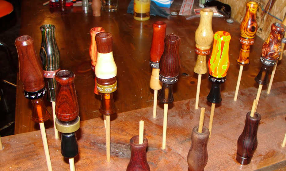 This photo provided by courtesy of Dave Estis shows duck calls created by Tate Estis in a workshop at his home in New Kent, Va. Tate Estis was so fascinated by the duck calls he and his father used to duck hunt, he started pulling them apart to see how they worked and eventually he made them. Every duck call he creates is unique. (AP Photo/Dave Estis)