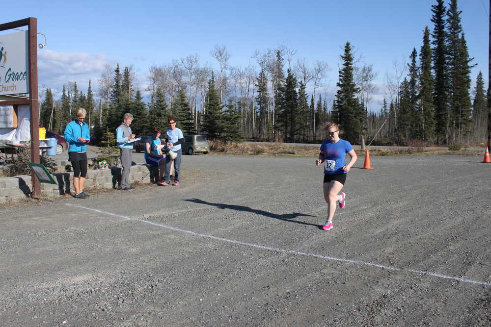 Photo by Kelly Sullivan/Peninsula Clarion Tesia White was a runner at the second annual CARE 2RUN 5k sponsored by the Peninsula Grace Brethren Church, Thursday, May 15, on Kalifornsky Beach Road.