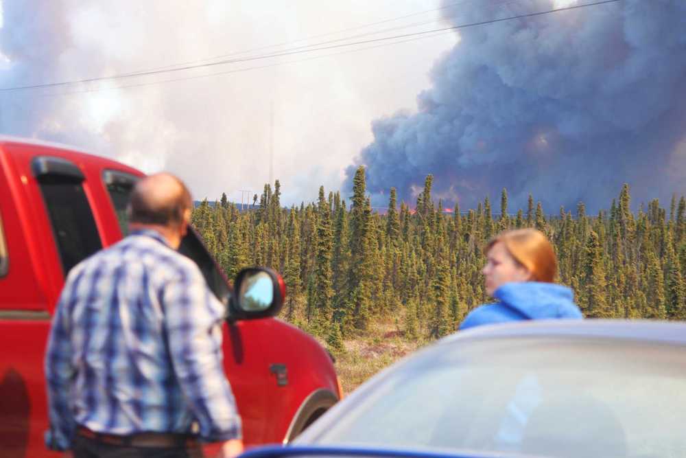 Photo by Rashah McChesney/Peninsula Clarion  A wildfire that began Monday near Funny River Road in Soldotna has spread and consumed more than 7,000 acres in about 24 hours. Shown here Tuesday May 20, 2014 the fire is more than 10 miles long and about a mile wide.