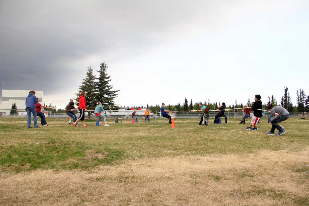 Kenai Middle School students play four-way tug-of-war on Wednesday, the last day of school, in Kenai. Photo by Kaylee Osowski/Peninsula Clarion