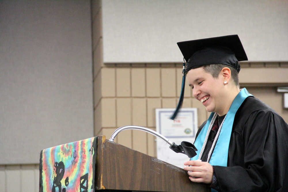 Jordan Fletcher, River City Academy graduate laughs during a speech at the school's graduation ceremony at the Soldotna Regional Sports Complex on Wednesday. Photo by Kaylee Osowski/Peninsula Clarion