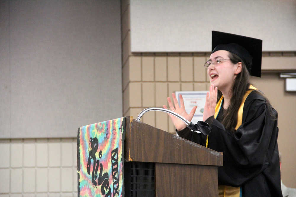 River City Academy graduate Kiowa Richardson gives a theatrical valedictorian speech at the school's graduation ceremony at the Soldotna Regional Sports Complex on Wednesday. Photo by Kaylee Osowski/Peninsula Clarion
