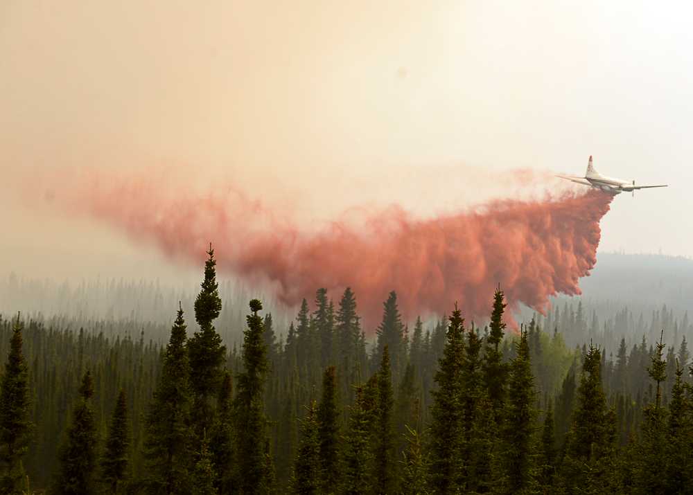 Photo by Rashah McChesney/Peninsula Clarion  Several dozen smaller fires flared up along the north shore of Tustumena Lake Friday May 23, 2014 as fire crews worked to contain the nearly 70,000 acre Funny River Horse Trail wildfire on the Kenai National Wildlife Refuge.