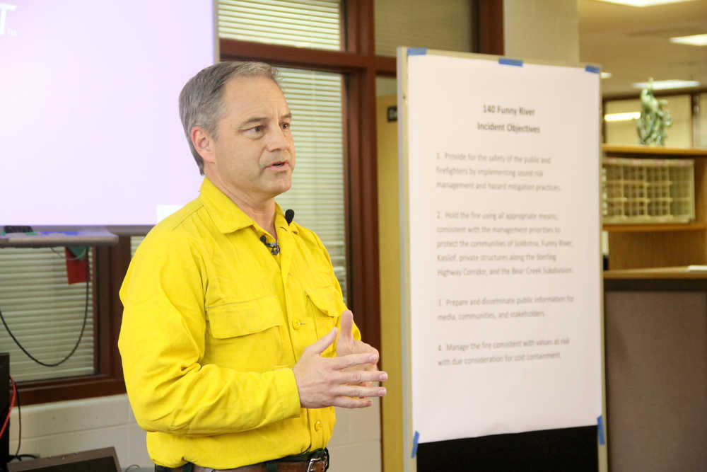 Gov. Sean Parnell speaks at a media briefing Sunday at the incident command center at Skyview High School. Photo by Kaylee Osowski/Peninsula Clarion