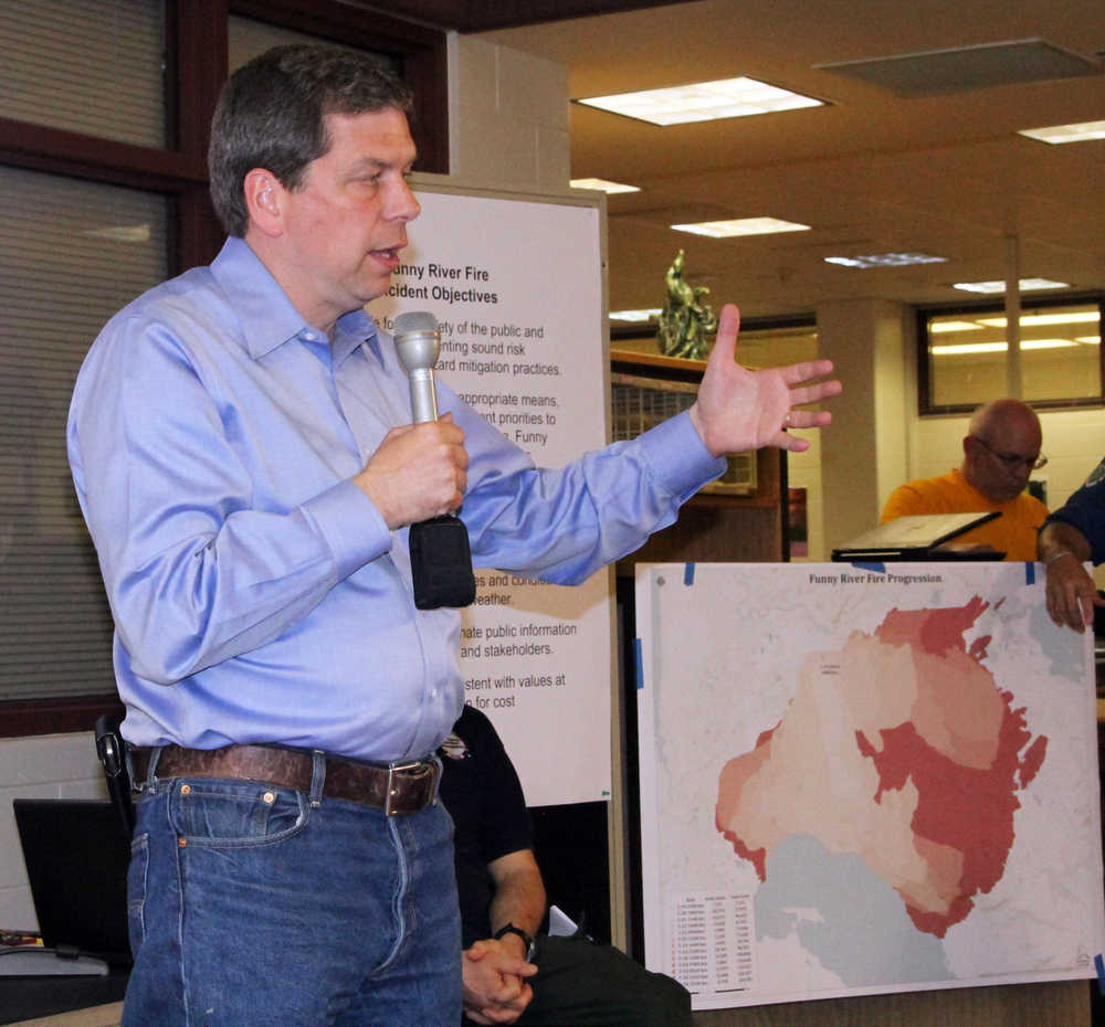 Photo by Dan Balmer/Peninsula Clarion US Senator Mark Begich thanks firefighters for their efforts in the Funny River Road wildfire during a media briefing Tuesday.
