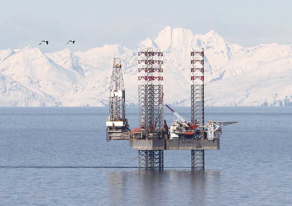 Photo by Brian Smith/Peninsula Clarion The Endeavour-Spirit of Independence jack up rig, seen here in early April at the Cosmopolitan site near Anchor Point, has spudded its first well nine months after it arrived in Cook Inlet from Singapore in mid-August 2012. Buccaneer said it would drill to a depth of 8,000 feet to test for oil and gas on the site. Drilling is expected to take 45 days.