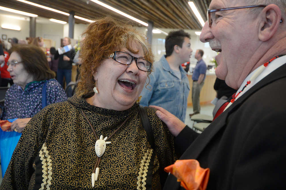 Photo by Rashah McChesney/Peninsula Clarion Rose Tepp, tribal chair for the Kenaitze Indian Tribe and Gary Hartz of the Indian Health Services laugh together during the grand opening of the Kenaitze Indian Tribe's new Dena'ina Wellness Center Thursday June 12, 2014 in Kenai, Alaska.