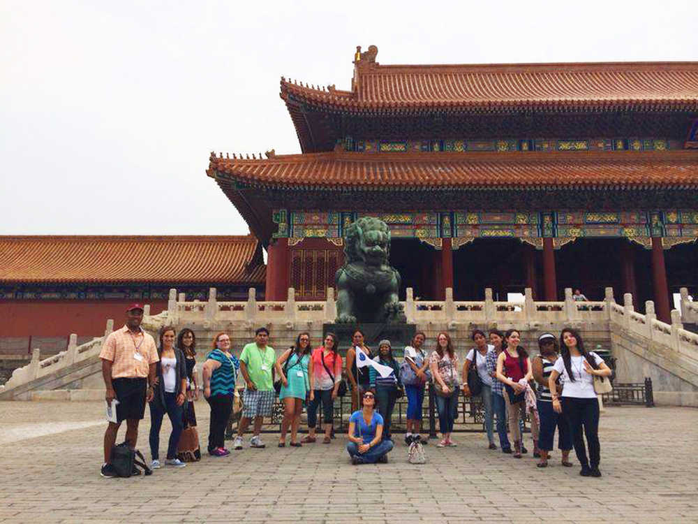 Photo courtesy Iris Fontana Iris Fontana poses with her Envision Global Forum on Medicine and Science  group outside of the Forbidden City in Beijing China, this June.