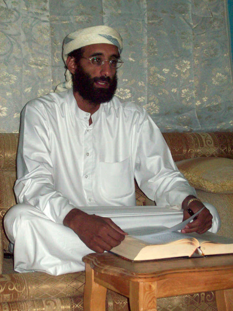 FILE - This October 2008 file photo shows Imam Anwar al-Awlaki in Yemen. A federal appeals court on Monday, June 23, 2014, released a previously secret memo that provided legal justification for using drones to kill Americans suspected of terrorism overseas. The memo pertained specifically to the September 2011 drone-strike killing in Yemen of Anwar Al-Awlaki, an al-Qaida leader who had been born in the United States. (AP Photo/Muhammad ud-Deen, File)