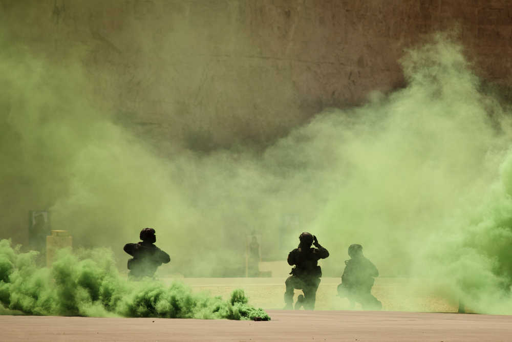 FILE - In this Thursday, June 20, 2013 file photo, soldiers participate in a combined special operations demonstration with commandos from Jordan, Iraq and the U.S. as part of Eager Lion multinational military maneuvers, at the King Abdullah Special Operations Training Center (KASOTC) in Amman, Jordan. The White House soon may sign off on a project to train and equip moderate Syrian rebel forces, according to Obama administration officials. The move would significantly boost U.S. support for rebels seeking military help to oust Syrian President Bashar Assad. President Barack Obama is considering sending a limited number of American troops to Jordan to be part of a regional training mission that would instruct carefully screened members of the Free Syrian Army on tactics, including counterterrorism operations, the officials said.(AP Photo/Maya Alleruzzo, File)